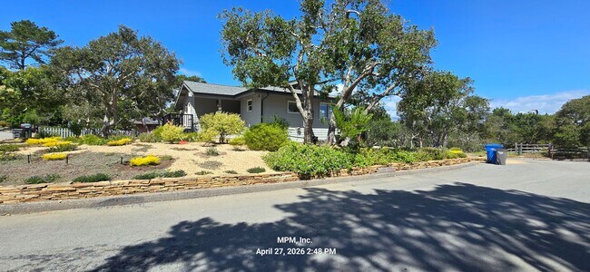 Photo - large custom home with peek a boo ocean views
