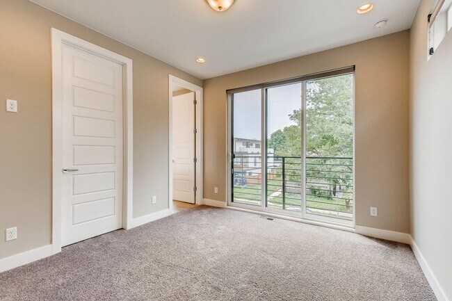 Photo - Upscale 3 Bedroom Townhome with Garage Att...