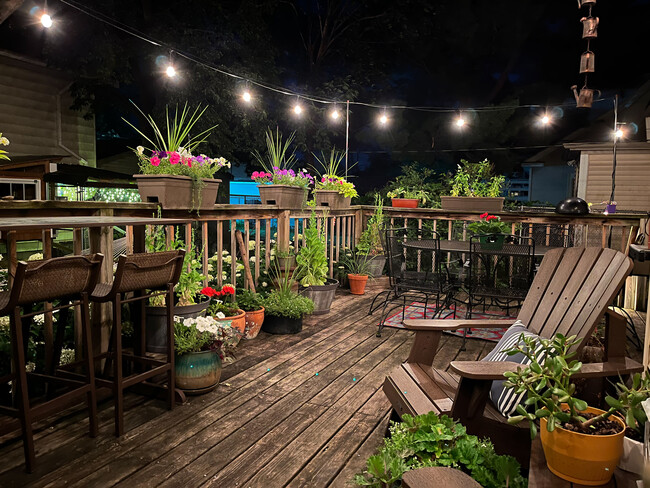 Large deck with patio lights - the best place to enjoy a summer evening. - 819 Edmund Ave House