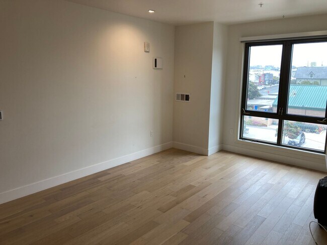 Photo - Live at the beach! Modern 2 bedroom 2 bath condo blocks from the beach w/parking and washer/dryer... Unit 413