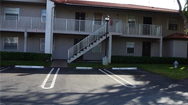 Building Photo - 8820 Royal Palm Blvd Unit 109-4 Rental