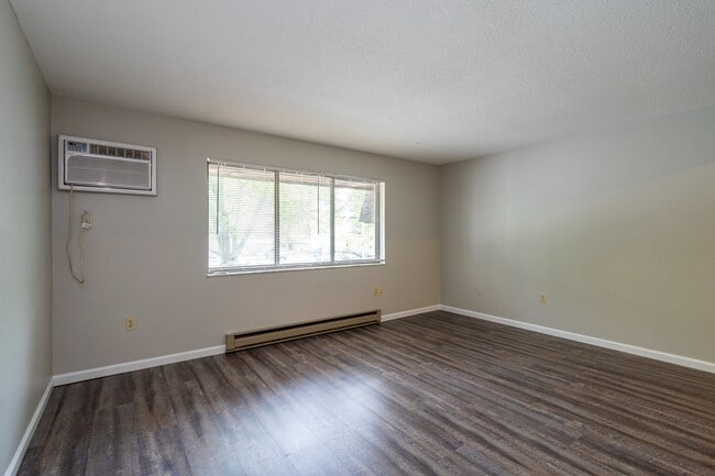 Updated Apartments Featuring Hardwood Style Floors, Carpeted Bedrooms, Neutral Paint Schemes, Granite Style Counters, Hardwood Style Floors, Shaker Style Cabinets, Matching Stainless Steel Appliances, Spacious Closets