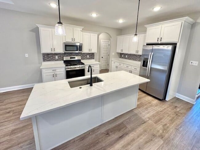 Photo - Exquisite new construction 4BR home now be...