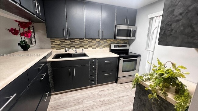 Building Photo - 7610 Stirling Rd Unit 103B Rental