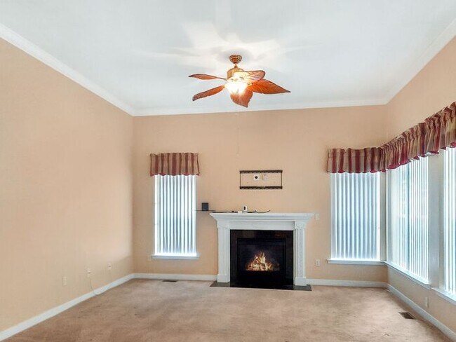 Photo - Single Family Home with 2 Car Garage Deck ...