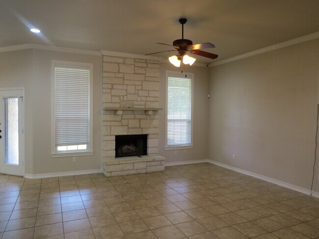 Photo - "Spacious 4-Bed Oasis in Killeen with Granite Touches & Cozy Fireplace!"