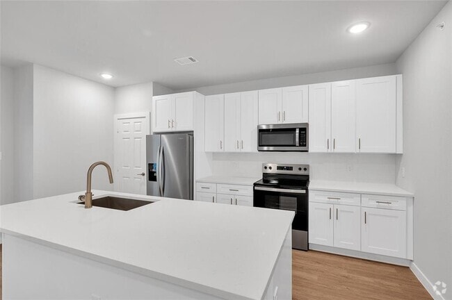 Building Photo - 7300 Magnolia Pkwy Unit 1103 Rental