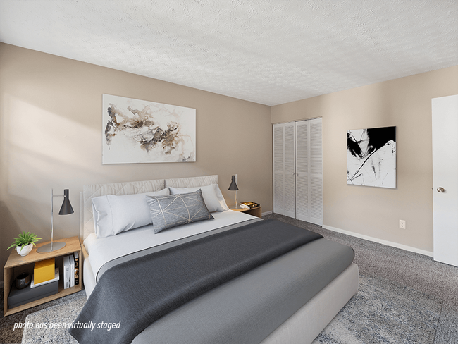 Carpeted Bedroom with Closet