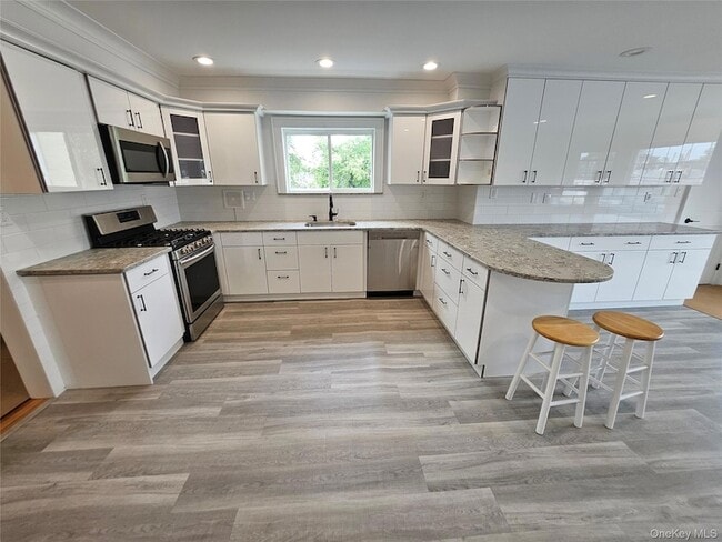 Building Photo - 357 Hicksville Rd Rental