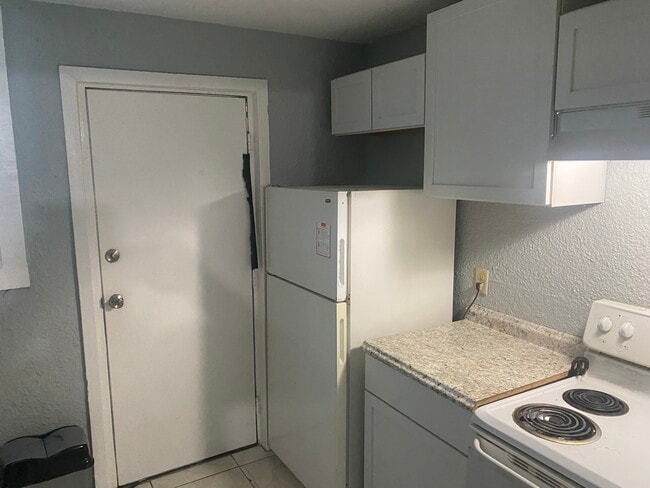 Kitchen with refrigerator and stove and oven - 892 Applewood St Unit A