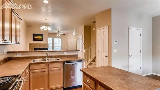 Kitchen with open view to living room