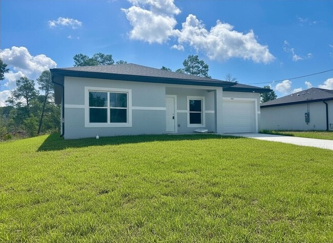 Building Photo - Brand-New Modern 2BR/2BA Home with Garage – Desirable Lake Placid Location