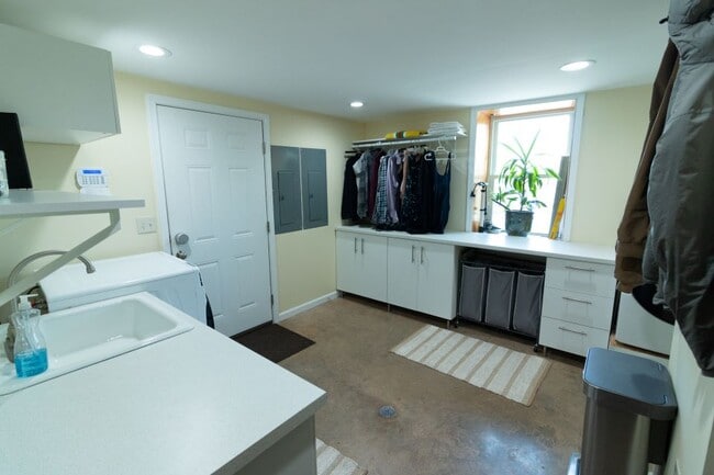 Laundry Room with Washer and Dryer and Plenty of Counter Space - 801 N Main St