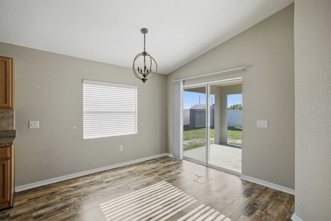 Photo - 4BR Gated Community Home with Fenced Yard, 2-Car Garage & Open Floor Plan