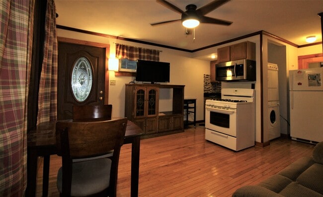 In unit washer and dryer next to refrigerator - 251 Lake Shore Dr N Unit #2