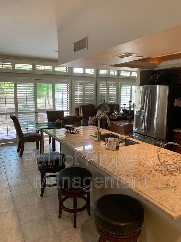 Building Photo - 9705-9705 E Mountain View Rd