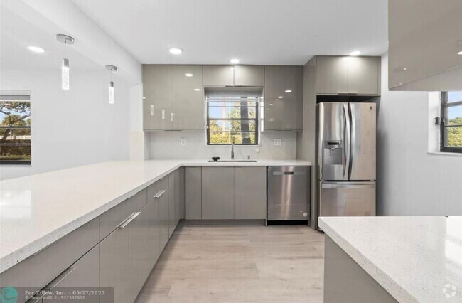 Building Photo - 6085 N Sabal Palm Blvd Unit 6085 Rental
