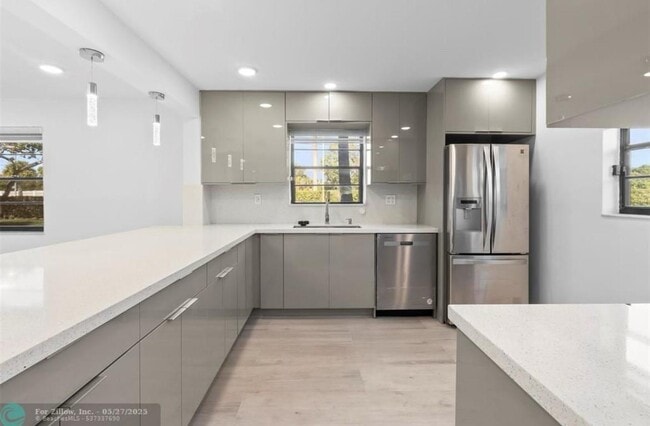 Building Photo - 6085 N Sabal Palm Blvd Unit 6085 Rental