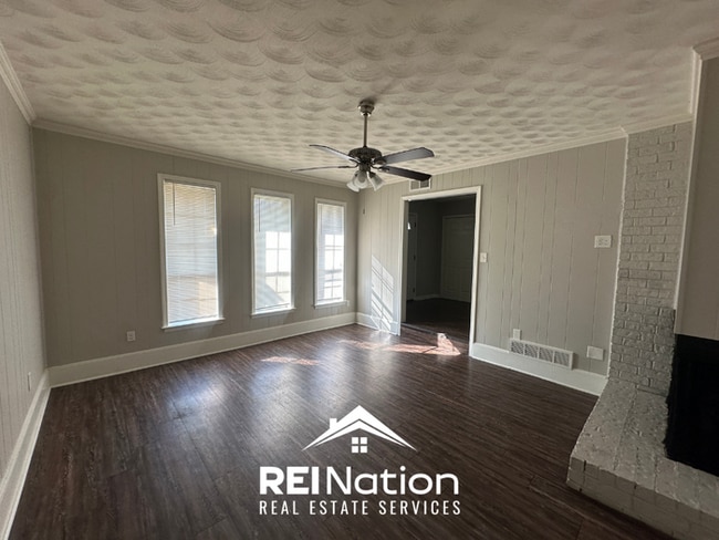 Spacious 4BR/2BA Memphis Rental with 2-Car Garage, Hardwood Floors & Fireplace