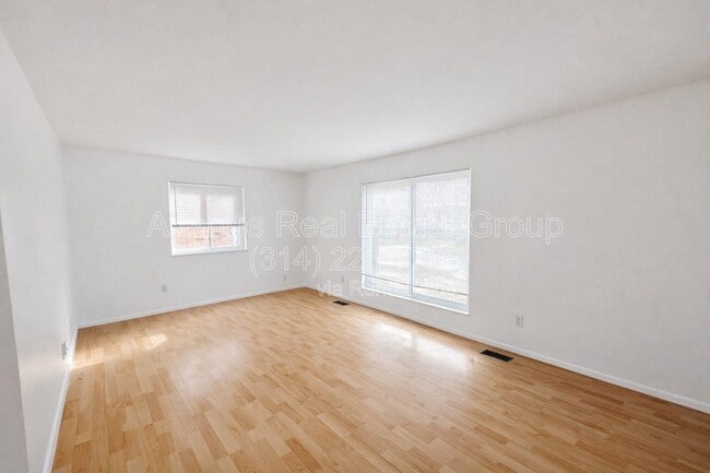 Building Photo - 10065 Puttington Dr Unit A