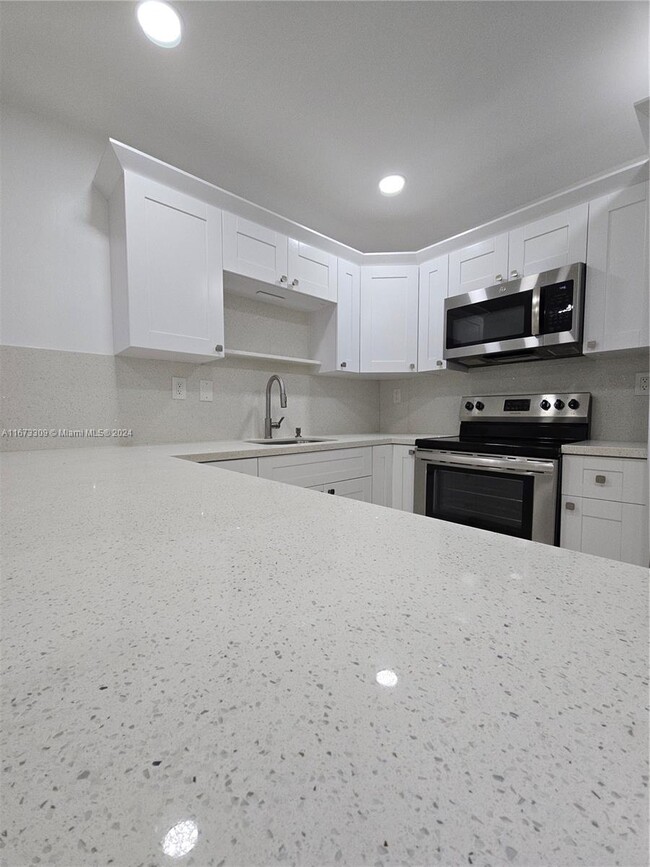 Building Photo - 13210 SW 17th Ln Unit #5-18 Rental