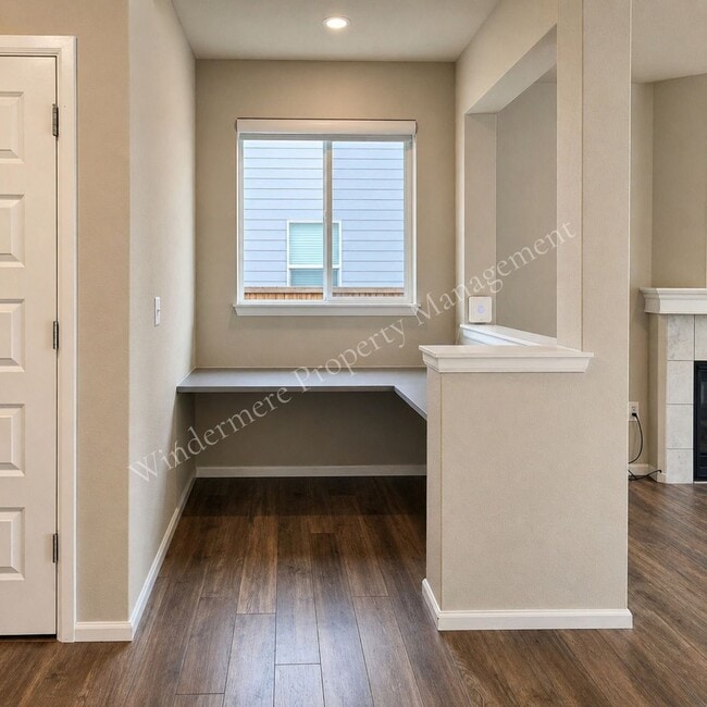 Photo - Spacious 4 Bedroom Home with Gas Fireplace, Office Space & 2-Car Garage!