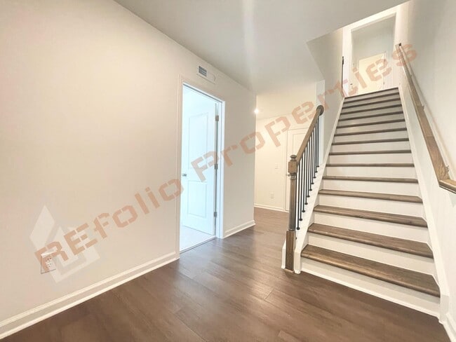 Photo - Brand New 3 Story, 4 bedroom, 3.5 bathroom Townhome Featuring a 1st floor Guest Suite, 2 Car Gara...