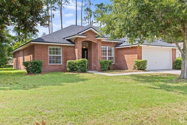 Building Photo - Spacious 3/2  brick home in a well establi...