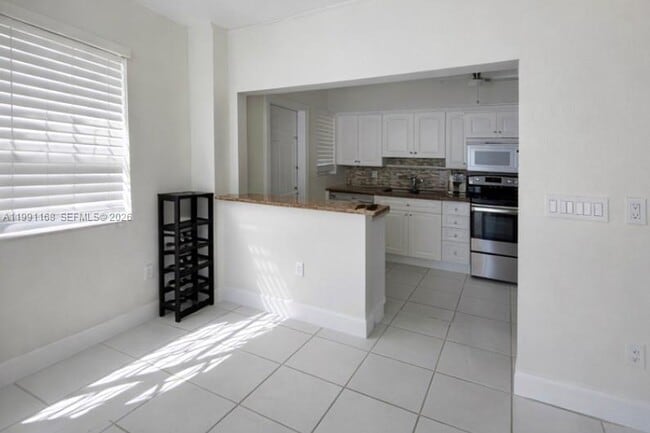 Photo - 462 Golden Isles Dr Unidad 210