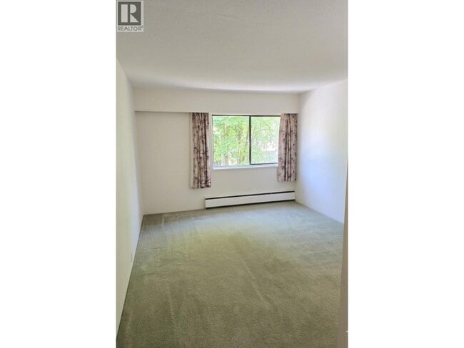 Photo - 6560 Buswell St Unit 206