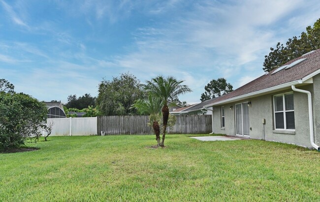 Photo - 1,850 Sq Ft 3-Bed, 2-Bath Orlando Home – Lawn Care Included & Fully Updated!