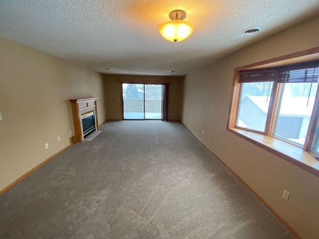 Photo - Top Floor Condo Available March 1, Open Floor Plan, Balcony, Fireplace, Walk-in Closet, 2 Baths, ... Unit 217