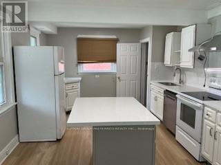 Photo - 28 Base Line Rd E