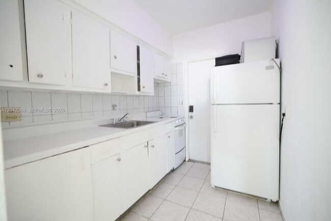 Building Photo - 770 83rd St Unit 3