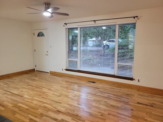 Living room with gleaming hardwood floors - 13344 23rd Pl NE