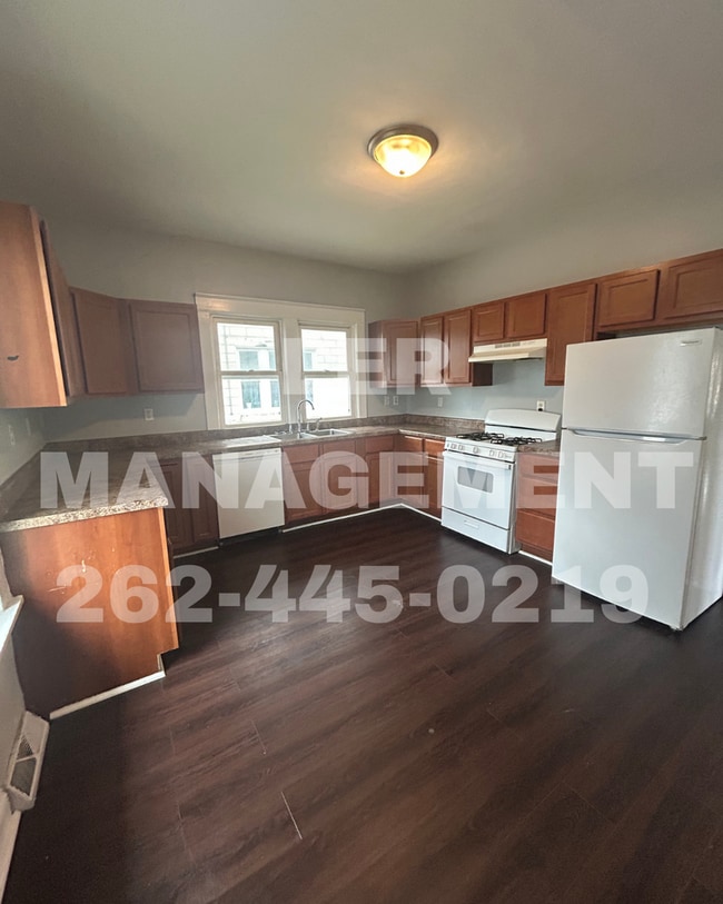 Building Photo - 7324 38th Ave Unit Front
