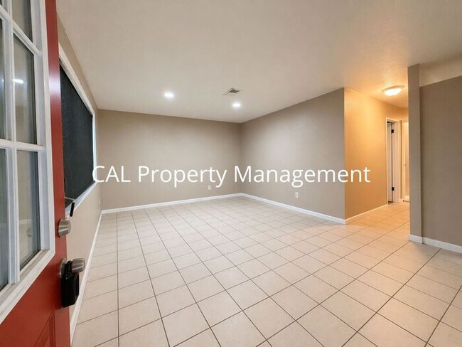 Photo - Spacious 4-Bedroom Home with 2-Car Garage & Backyard Oasis