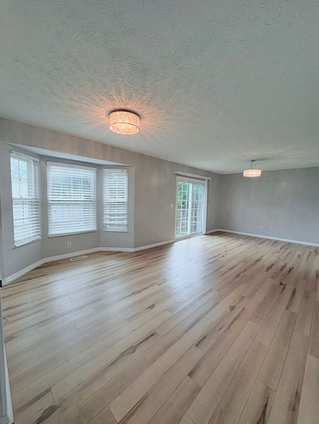 Photo - 4BR/2.5BA | Newly Flooring | Garage | Gated back yard
