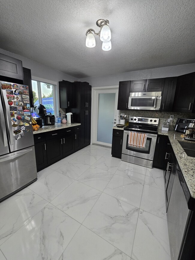 Building Photo - 2240 NW 178th St Unit 3