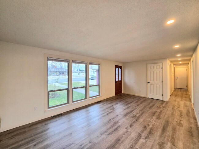 Photo - 3 Bed / 2 Bath Rambler – Huge Fenced Yard + 2-Car Garage – Available Now