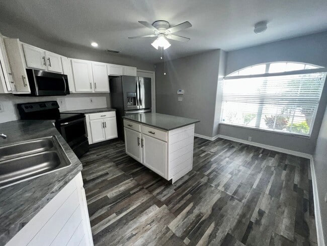 Photo - RESERVE AT WEDGEFIELD 3 bedroom 2 bath home with stainless appliances, laminate flooring and a fe...