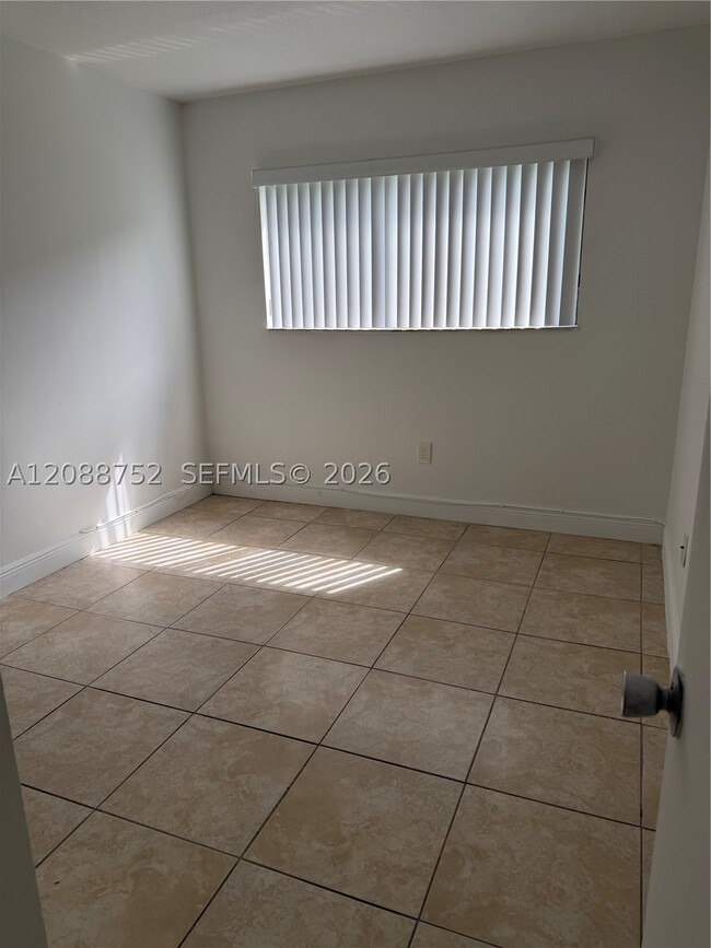Building Photo - 7425 SW 152nd Ave Unit 11-106