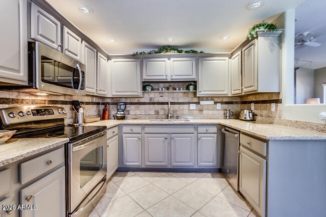 Building Photo - 9455 E Raintree Dr Unit 2039