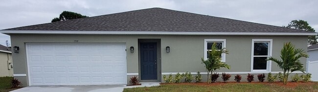 Building Photo - *** Beautiful 4BR/2BA Home with Large Lanai in Palm Bay!