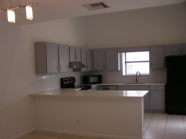 Photo - 1103 Summerwinds Ln Townhome