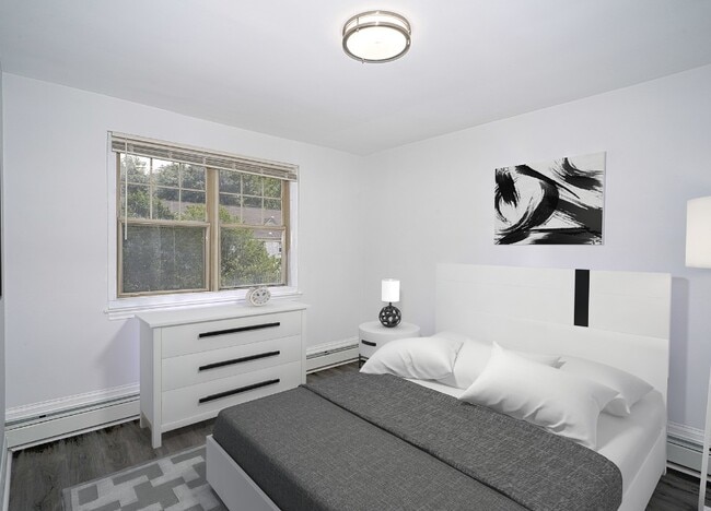 Furnished bedroom at Drumcastle Apartments in Baltimore, MD
