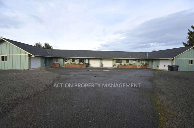 Photo - 2 bed, 2 bath, 1 car garage- water, sewer and yard care included! Unit A