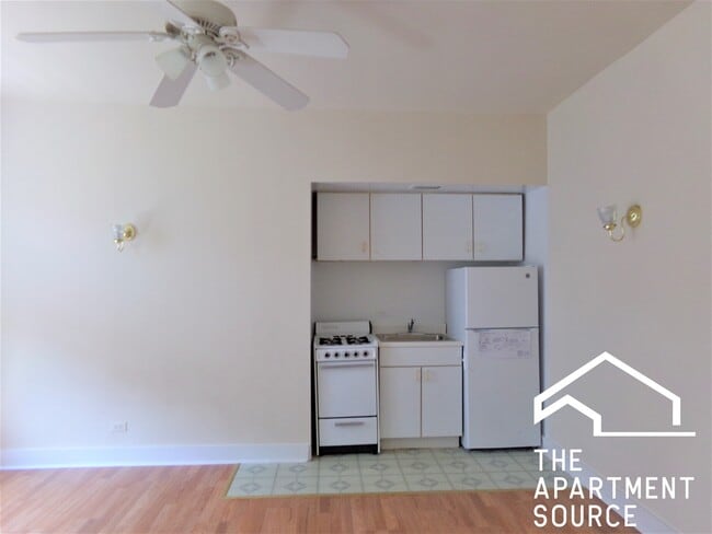 Building Photo - 6916 N Lakewood Ave Unit 409