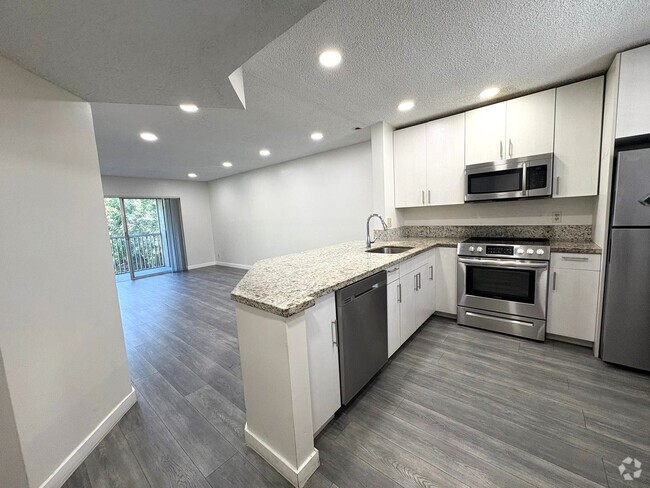 Building Photo - 8820 Royal Palm Blvd Unit #203 Palm Village Rental