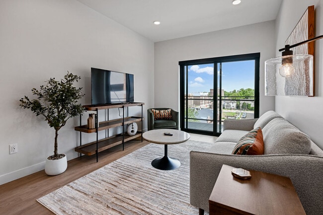 Furnished Living Room - Urbane115 Apartments